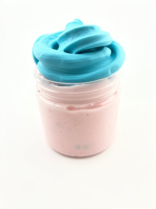 Strawberry ice cream with blueberry fudge